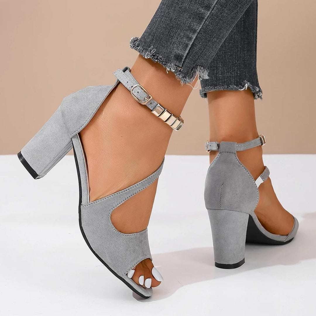 Women's comfortable open toe block heel sandals with a delicate beaded ankle strap detail.