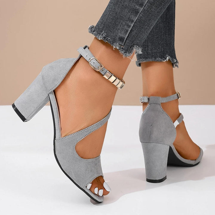 Women's comfortable open toe block heel sandals with a delicate beaded ankle strap detail.