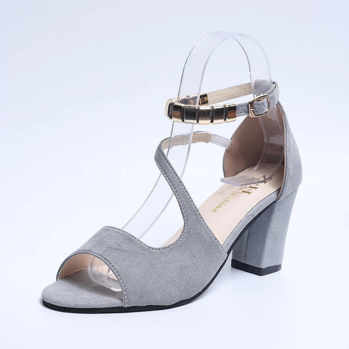 Beaded ankle strap block heel sandals for women, offering both style and comfort.