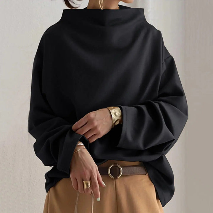 Women's elegant black high-neck long-sleeve top, perfect for sophisticated workwear or versatile casual chic outfits.
