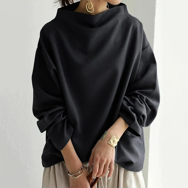 Black elegant high-neck long-sleeve top for women, ideal for sophisticated workwear, layering, and versatile styling.