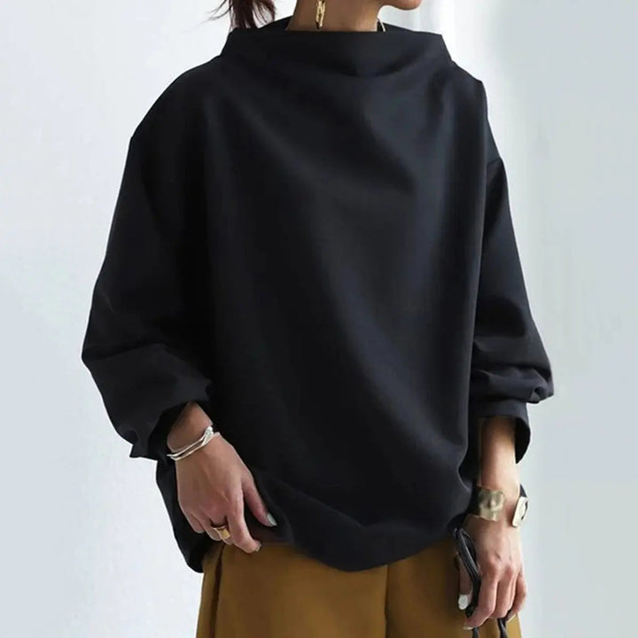 White elegant high-neck long-sleeve top, a versatile piece for women's sophisticated workwear and casual layering outfits.