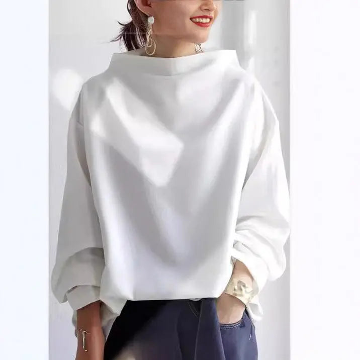 Chic women's high-neck long-sleeve top in black, blue or white, blending modern elegance with versatile casual style.