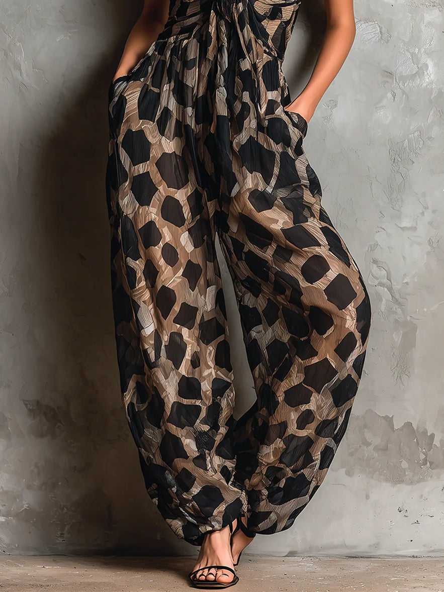 Women's elegant black leopard print maxi dress featuring a V-neck wrap design. Ideal for parties or special occasions.