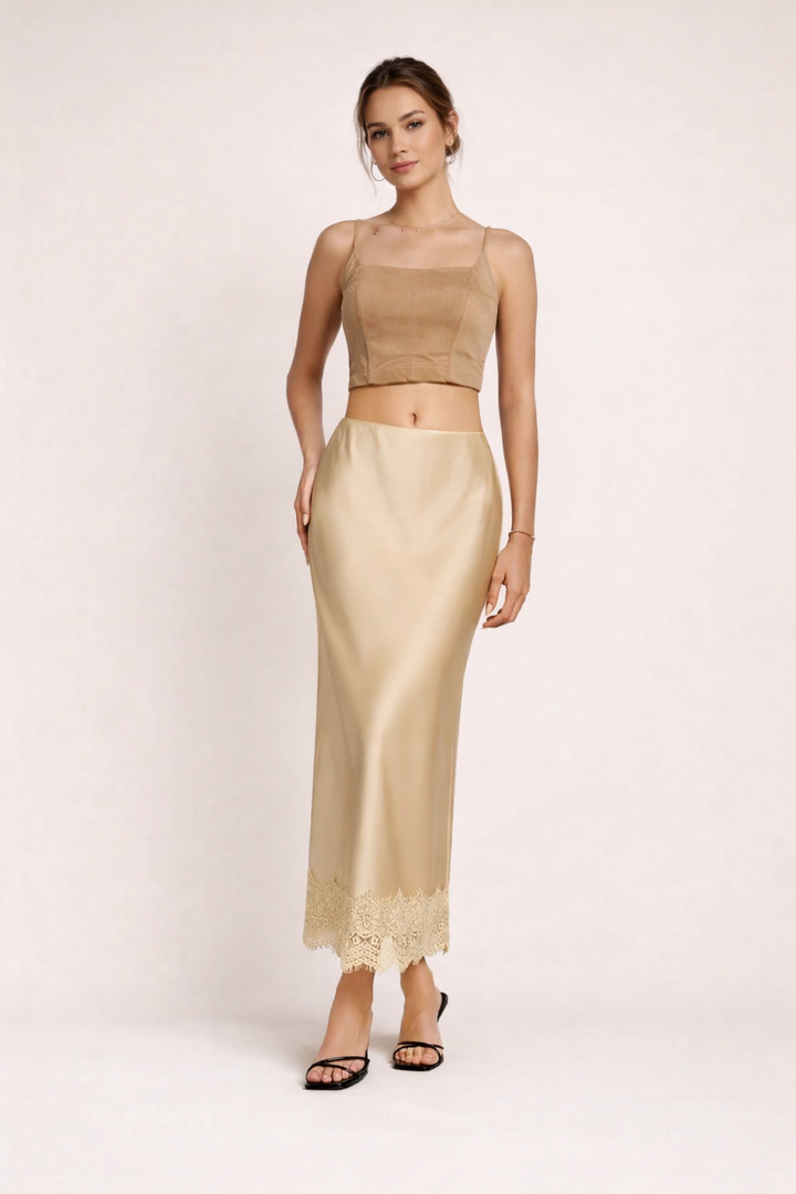 Women's elegant black maxi skirt with delicate lace hem, perfect for formal occasions & evening wear.