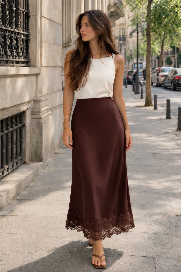 Women's elegant evening maxi skirt, a sophisticated long skirt with delicate lace hem for formal wear.
