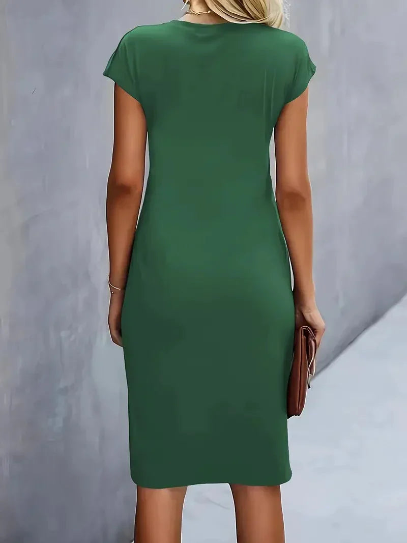 Textured fabric elegant women's midi dress, round neck, versatile for comfort and formal style.
