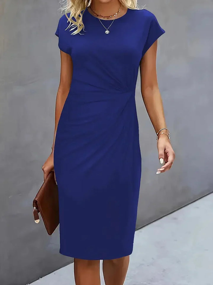 Sophisticated women's elegant midi dress, round neck, flattering for all figures, versatile use.