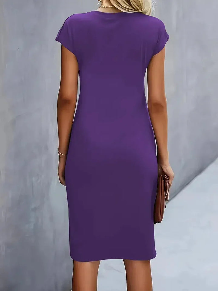 Timeless elegant women's midi dress, round neck, versatile for a polished, flattering look.
