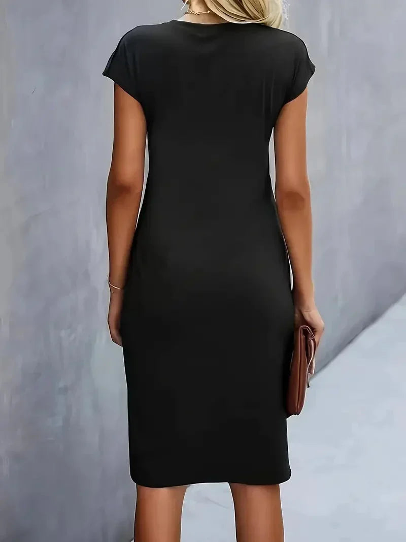 Stylish women's midi dress, elegant design, round neck, ideal for formal wear or business casual.