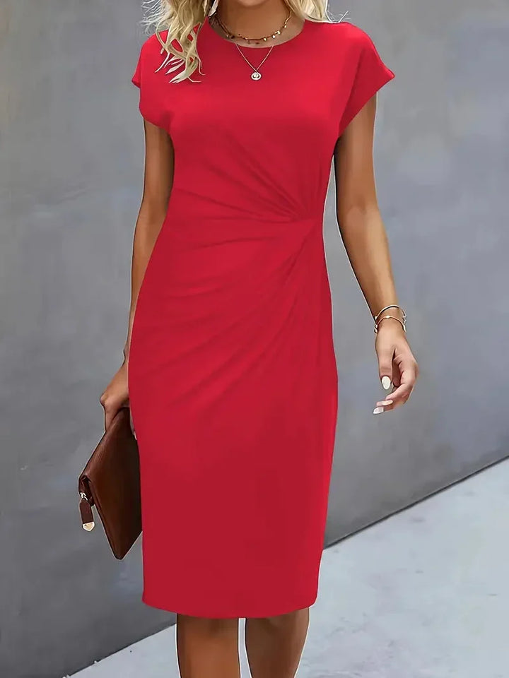 Flattering navy blue elegant midi dress for women, round neck, suitable for parties & events.