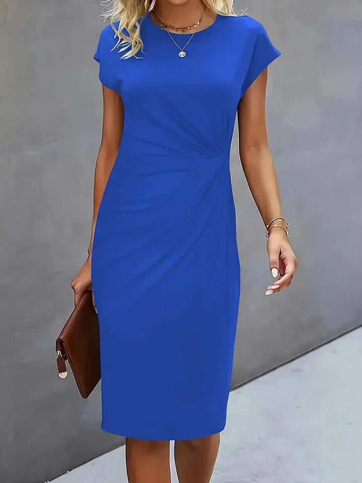 Chic women's midi dress in a versatile color, elegant round neck, great for any formal setting.