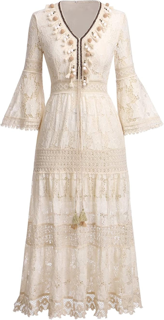 Close-up of intricate white lace detail on a women's elegant boho maxi dress, highlighting feminine apparel.