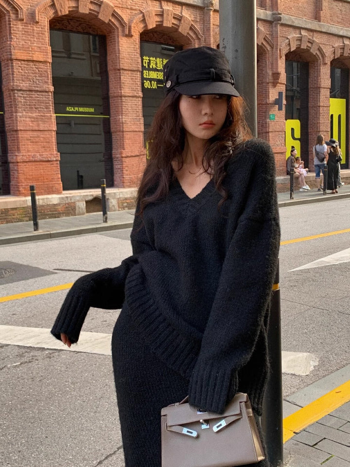 Stylish brown V-neck sweater and midi skirt set for women, a comfortable long sleeve two-piece outfit.