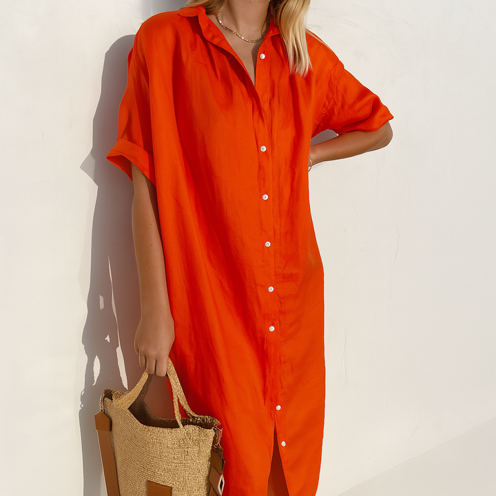 Elegant women's button-down midi shirt dress with a collared neckline, perfect for spring/summer fashion & work.