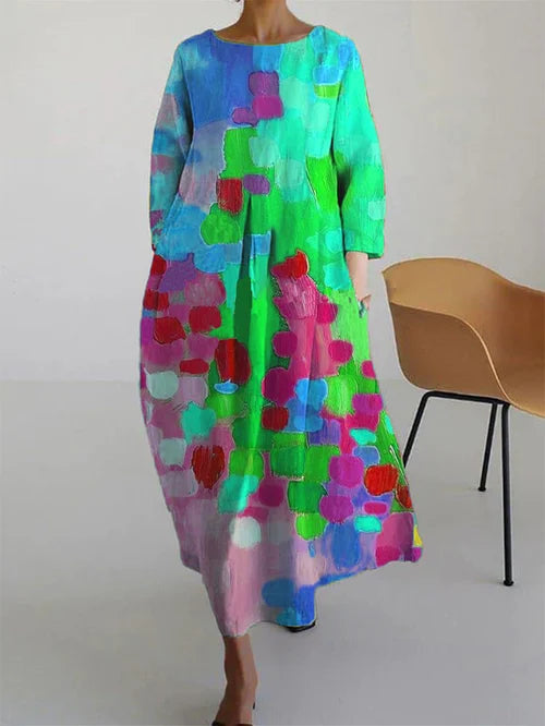 Flowy women's color block maxi dress. Elegant long sleeve casual style, ideal for versatile summer fashion.