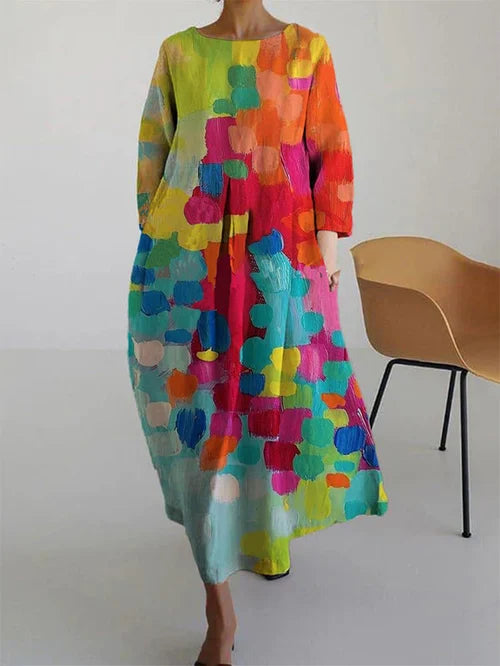 Stylish women's long sleeve color block maxi dress. Elegant yet casual, offering comfort and vibrant summer style.
