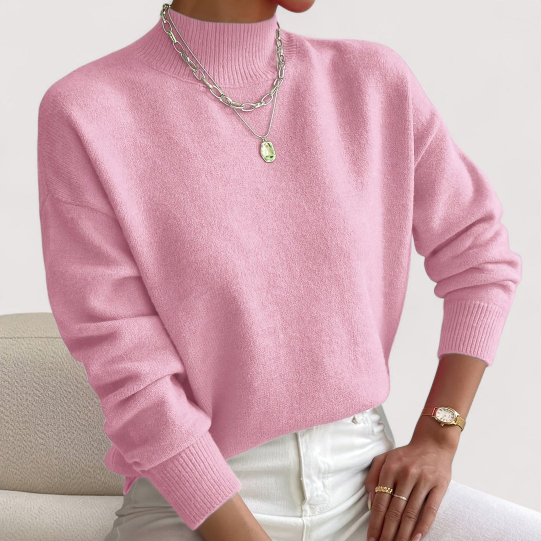 Chic long-sleeve women's turtleneck, an elegant knit pullover ideal for office or casual winter wear.