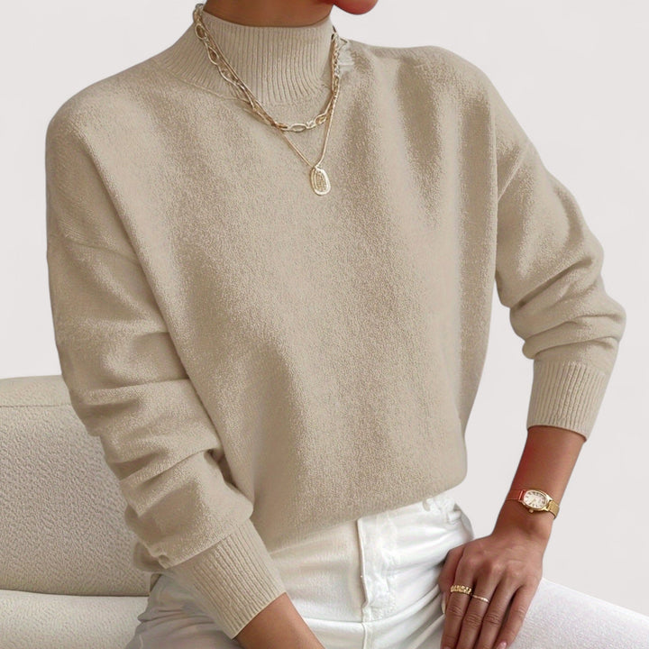 Solid color women's elegant turtleneck, a versatile long-sleeve knit perfect for chic winter outfits.