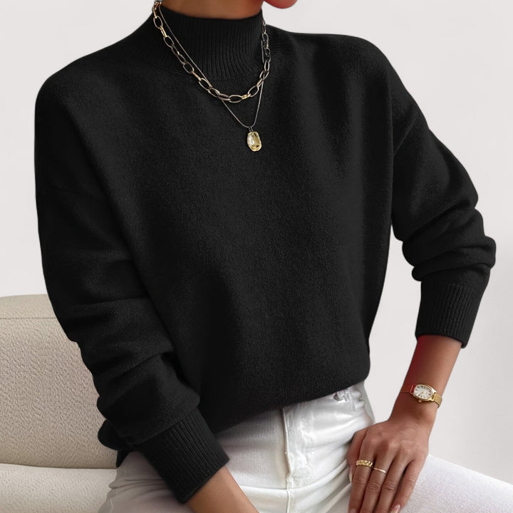 Cozy women's turtleneck sweater, a comfortable and stylish long-sleeve top for elegant winter fashion.
