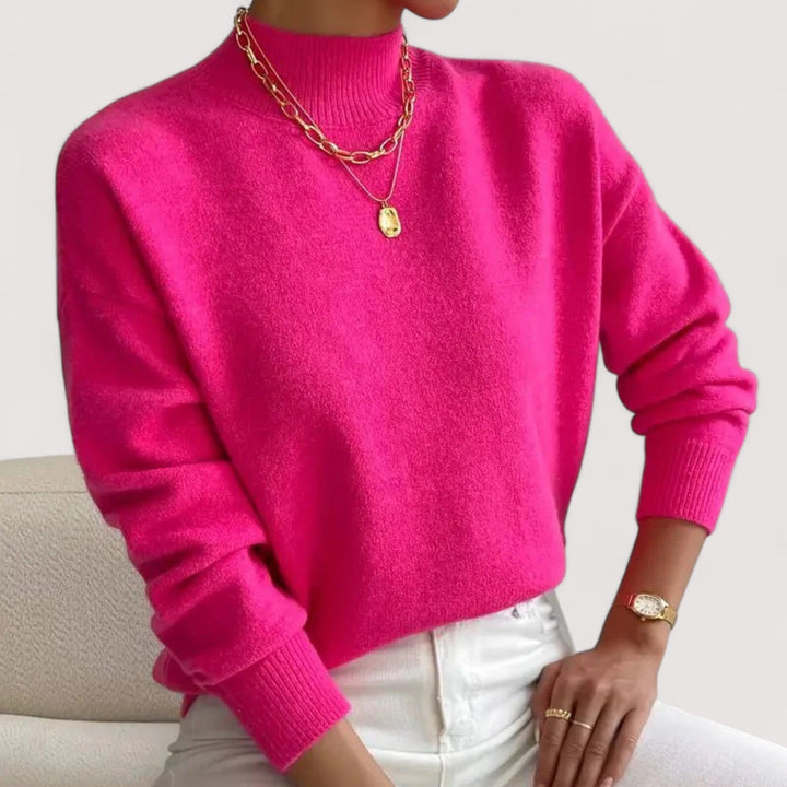 Soft knit women's turtleneck pullover, an elegant and warm winter top for versatile styling.