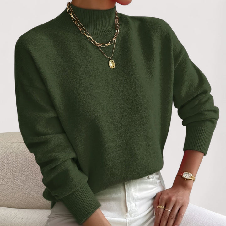 Fashionable women's elegant turtleneck sweater, a warm & cozy top for versatile winter fashion.