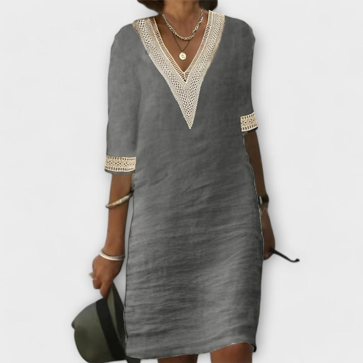 Versatile women's flowy crochet openwork dress, elegant casual style. Midi length, relaxed fit for comfort.