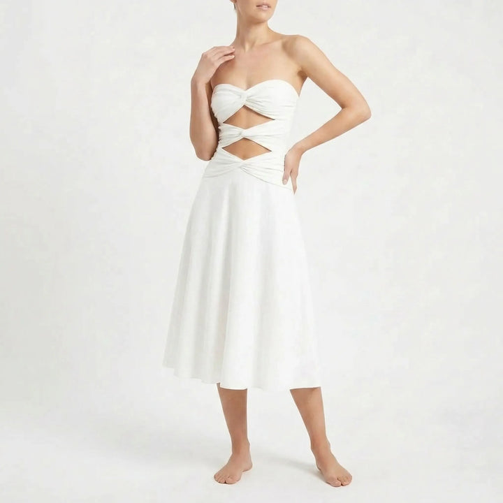 Women's summer fashion: elegant cutout monokini & comfortable resort skirt set.