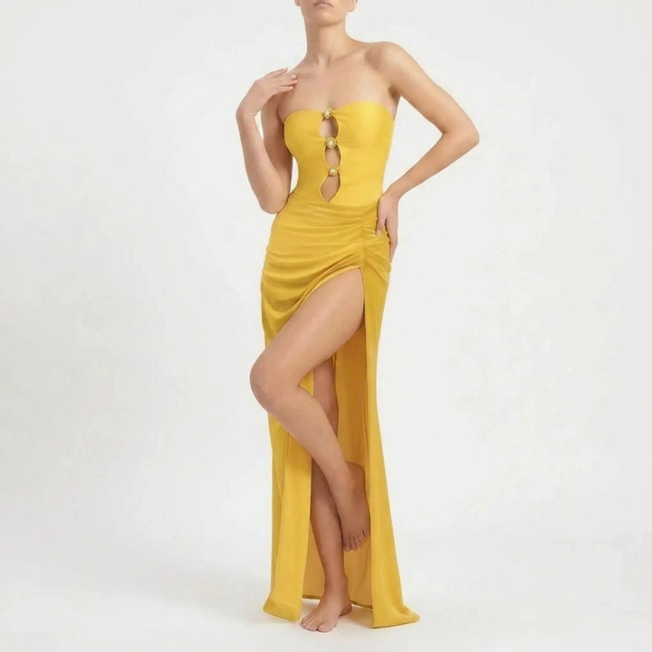 Women's elegant cutout one-piece with a matching flowy resort skirt. Perfect for summer.