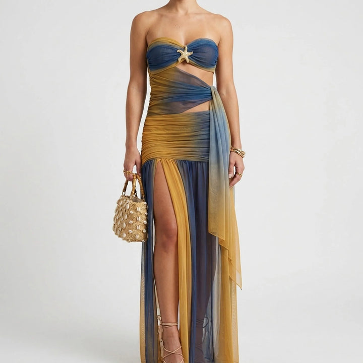 Women's elegant cutout monokini swimsuit & resort skirt set for sophisticated beach style.