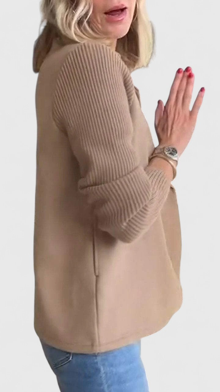 Double-breasted women's blazer with comfort sleeves, tailored design for a polished, sophisticated look.