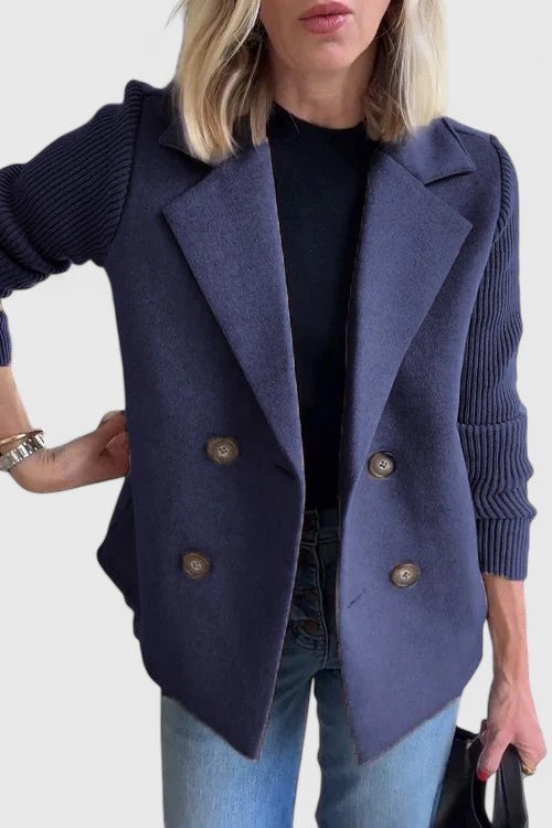 Elegant women's double-breasted blazer, a tailored fashion statement for sophisticated looks.