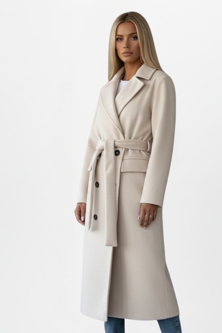 Classic women's long double-breasted coat with belt, offering warmth & style for fall and winter apparel.