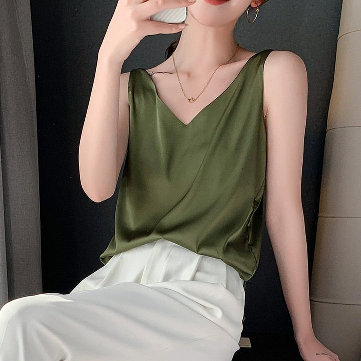 Relaxed fit women's draped tank top, an elegant and comfortable sleeveless blouse for summer.