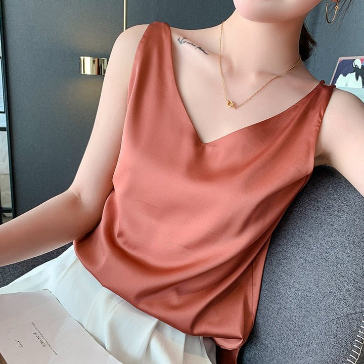 Versatile women's draped tank top, an elegant sleeveless blouse suitable for various casual or chic outfits.