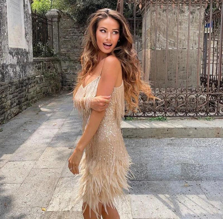 Women's stunning feather fringe mini dress, an elegant choice for special occasions & formal parties.