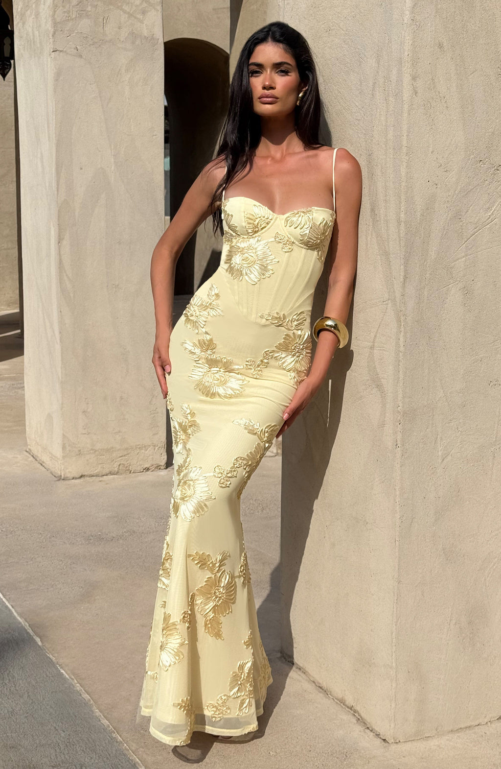 Side view: Women's glamorous floral appliqué corset mermaid maxi dress, showcasing its elegant silhouette.