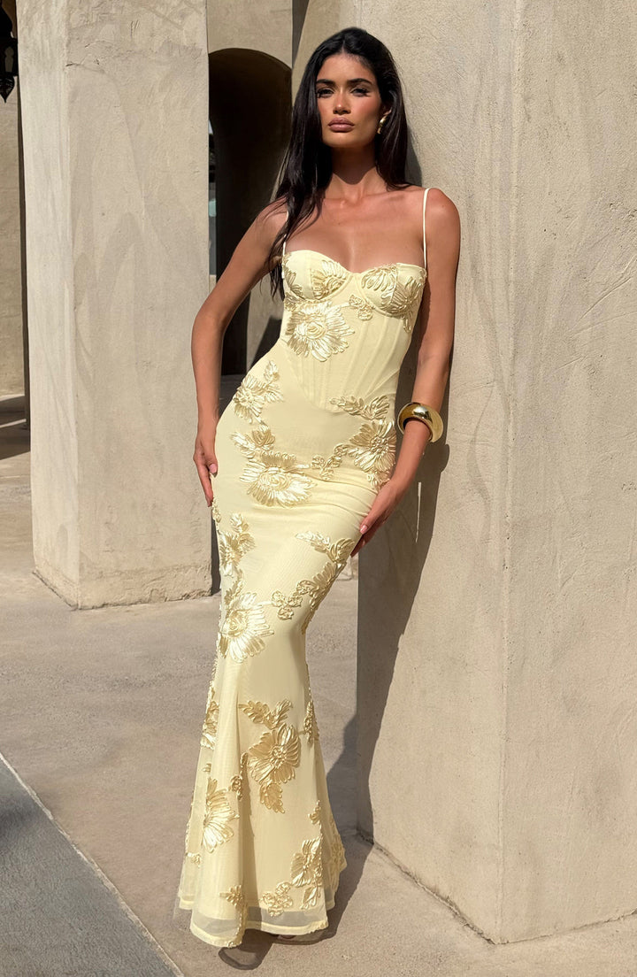 Side view: Women's glamorous floral appliqué corset mermaid maxi dress, showcasing its elegant silhouette.