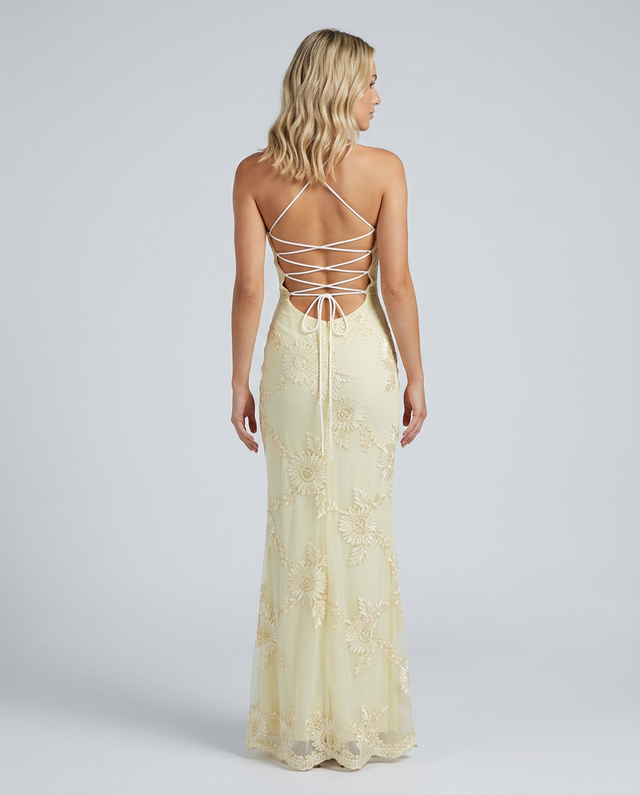 Stunning women's long floral maxi dress featuring intricate appliqué details and a lace-up back.