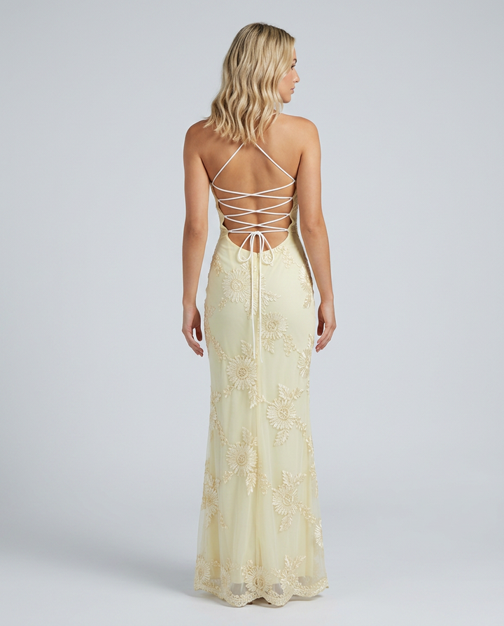 Stunning women's long floral maxi dress featuring intricate appliqué details and a lace-up back.
