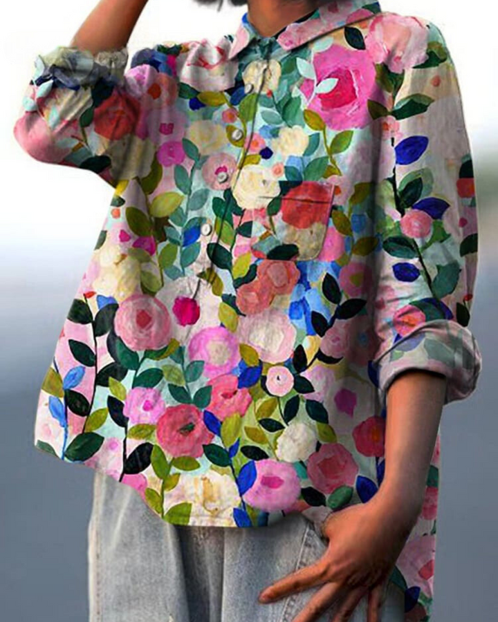 Trendy women's floral blouse, an elegant long sleeve top perfect for spring and summer fashion.