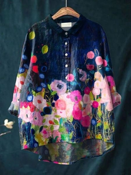 Summer top: a lightweight women's elegant floral blouse, comfortable and loose-fit with vibrant flowers.
