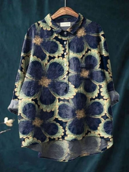 Close-up of the elegant flower print on a women's long sleeve blouse, offering comfort and style.