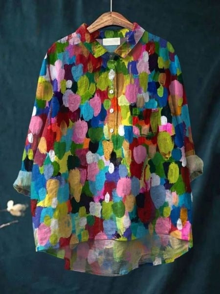 Model wearing a women's elegant floral blouse, showcasing its loose fit and trendy design.
