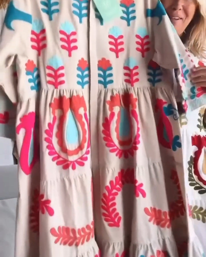Stylish women's floral print midi dress with A-line silhouette, perfect for casual summer wear.