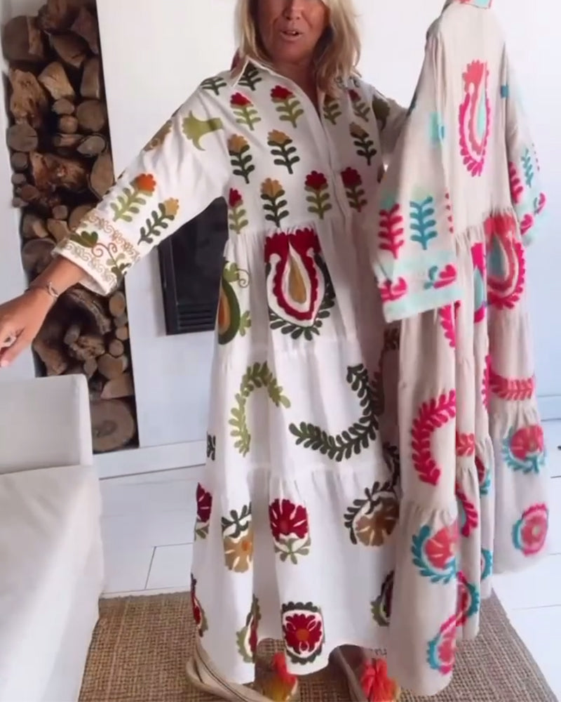 Flowy women's floral graphic midi dress, perfect for casual summer outings & elegant vacation style.