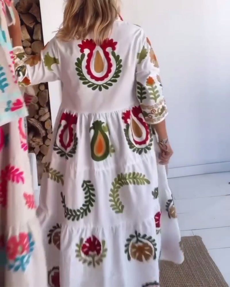 Women's A-line midi dress with a beautiful floral graphic print, offering an elegant yet casual look.