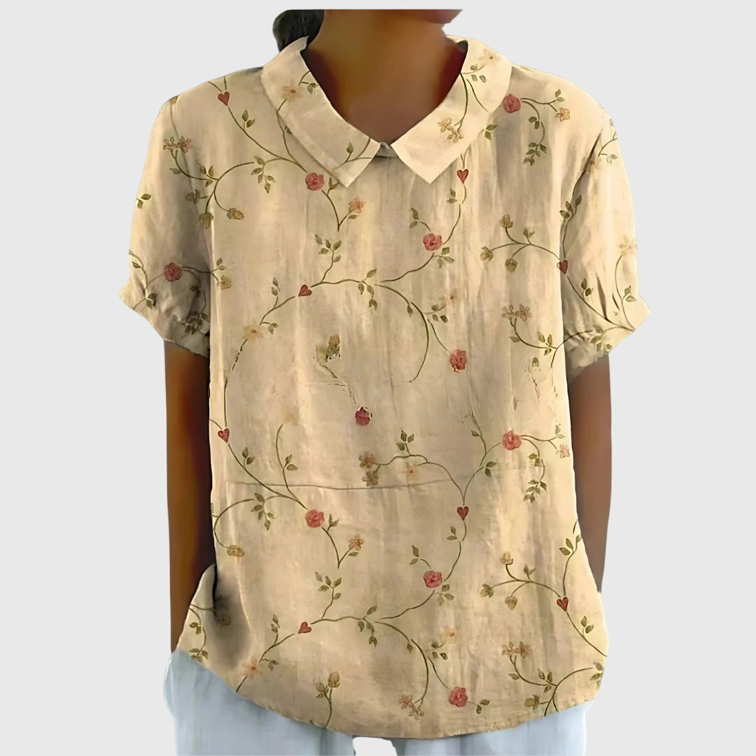 Chic floral print blouse for women, a relaxed fit casual top ideal for summer wear.