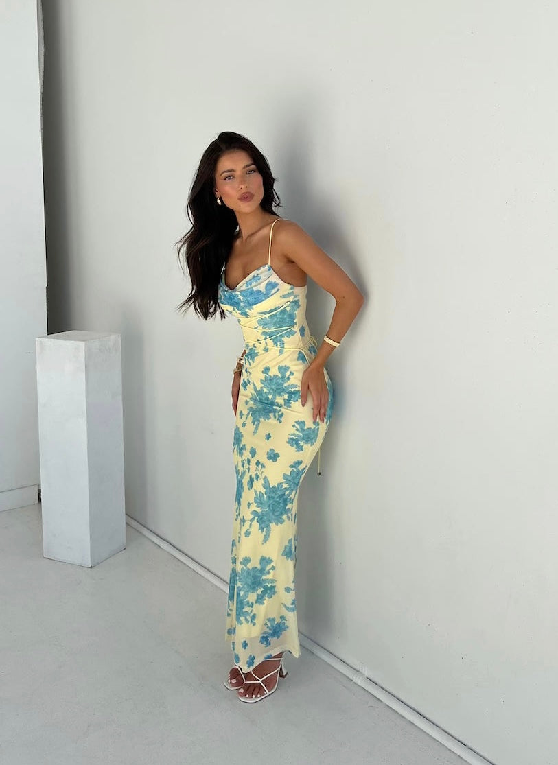 Women's elegant floral maxi dress, perfect for a wedding guest or summer party. Flowing & comfortable.