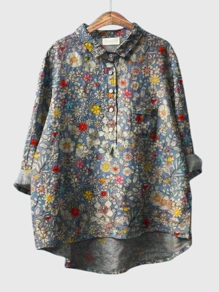 Elegant women's floral print button-down shirt, a versatile collared top for spring.